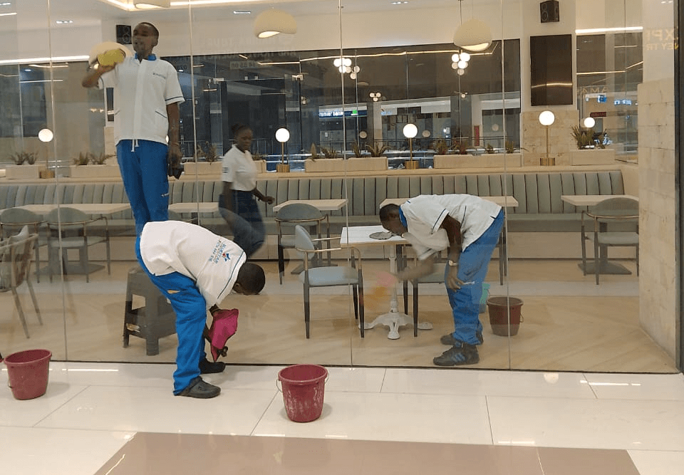 Office cleaning in Nairobi, Commercial cleaning in Nairobi, the best cleaning company in Nairobi, Bluestar Professional Cleaners Ltd cleaning retaurant glasses in Lavington, Nairobi. Commercial cleaning prices in Nairobi